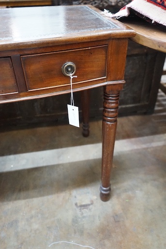 A Regency style mahogany bow front three drawer writing table, width 101cm, depth 61cm, height 76cm